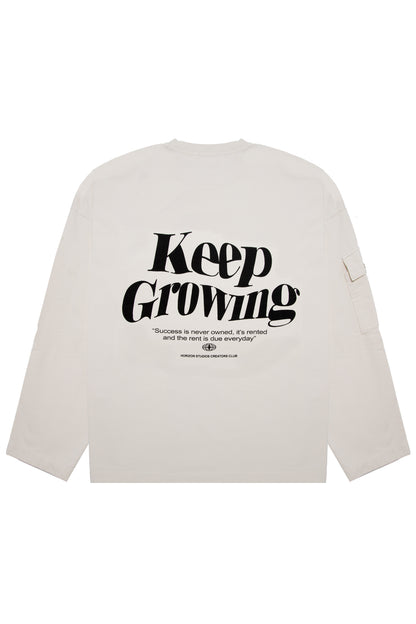 BEIGE “KEEP GROWING” CREWNECK